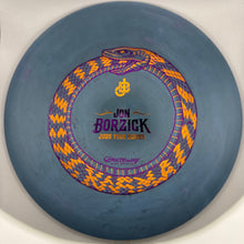 A disc golf disc on a white background, featuring a blue-gray body with a purple and orange snake graphic and the text 'Jon Borzick 2026 Tour Series' in the center.