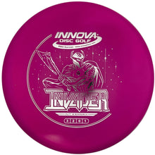 Pink Innova DX Invader disc golf putter with silver armored figure stamp, top view.