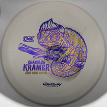 A white Gateway Disc Sports Chandler Kramer disc golf disc with a purple and yellow chameleon graphic and text.