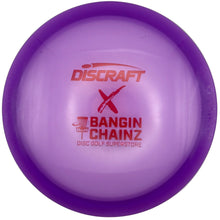 A purple Discraft X Bangin Chainz disc golf disc with red printed logos, resting on a white surface.