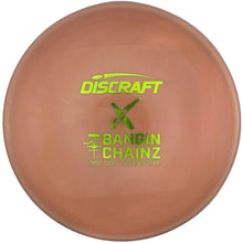 A Discraft Bandin Chainz disc golf disc in a peach-orange color, featuring a green logo and text, shown inside its white retail packaging.