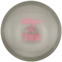 A translucent glittery gray Discraft X Bangin' Chainz disc golf disc with pink laser-etched branding, shown inside its white packaging box.