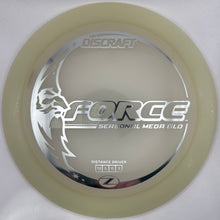 A Discraft Force distance driver disc golf disc in a translucent cream color with a silver metallic logo and text, shown on its white retail backing card.