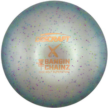 A Discraft Bangin' Chainz disc golf disc with a mint green and teal iridescent finish, speckled with purple, blue, and yellow flecks, and featuring gold foil branding.