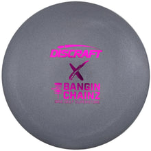A gray Discraft x Bangin' Chainz disc golf disc with bright pink foil stamping, shown inside its white protective packaging.