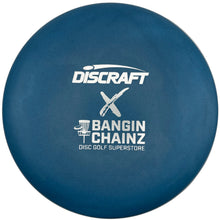 A blue disc golf disc with white printed logos for Discraft and Bangin' Chainz, shown on a white backing card with a purple edge visible on the right.