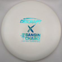 A white Discraft x Bangin' Chainz disc golf disc with holographic blue foil stamping, resting on a white surface.