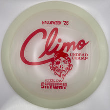 A translucent off-white disc golf disc with red printed graphics, including the text 'HALLOWEEN '26', 'Climo UNDEAD CHAMP', and '5.3 BLOW CHIMNEY', shown on a white background.