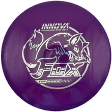 Purple Innova Star Fox midrange disc golf disc with silver fox stamp, top view.
