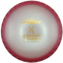 A Discraft X Bangin' Chainz disc golf disc with a translucent red outer rim and a milky white center, featuring gold foil branding.