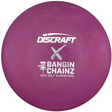 A purple Discraft x Bangin' Chainz disc golf superstore disc, printed with white logos, shown inside its white packaging box.