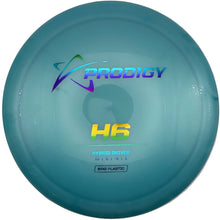 A disc golf disc, specifically a Prodigy H6 hybrid driver, in a white circular presentation box. The disc is a translucent light teal-blue color with the Prodigy logo and 'H6' printed on it.