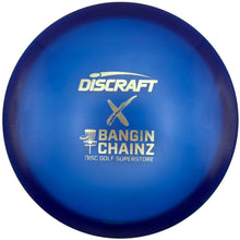 A blue Discraft Bangin' Chainz disc golf disc with gold foil lettering, resting on a white surface.