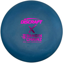 A blue Discraft Banger Chainz disc golf disc with a bright pink foil stamp, shown inside its white packaging sleeve.