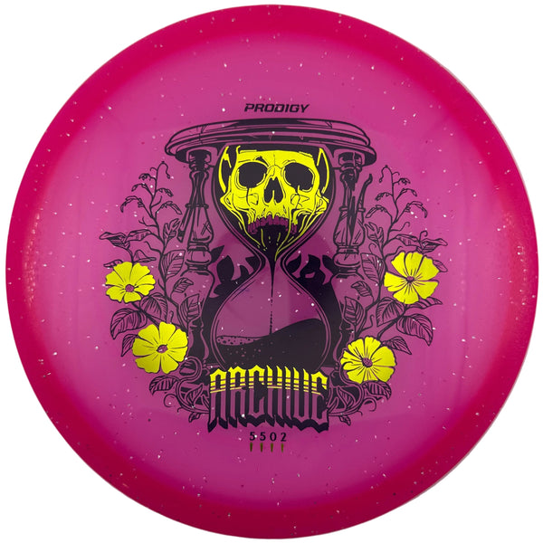 A pink disc golf disc with a yellow hourglass and skull graphic, surrounded by yellow flowers, labeled 'PRODIGY ARCHIVE' and 'S-02 FIT'.
