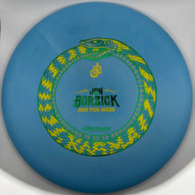 A blue disc golf disc with a yellow and green snake graphic and the text 'Jan Borzick' and '2024 Tour Series' in the center, photographed on a white background.