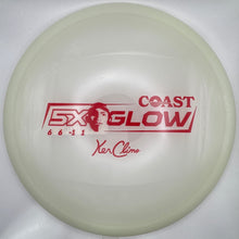 A translucent off-white disc golf disc with red printed graphics, including the text 'COAST GLOW' and 'Xan Clime', resting on a white foam insert.